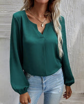 Blus med enfärgad med långärmad